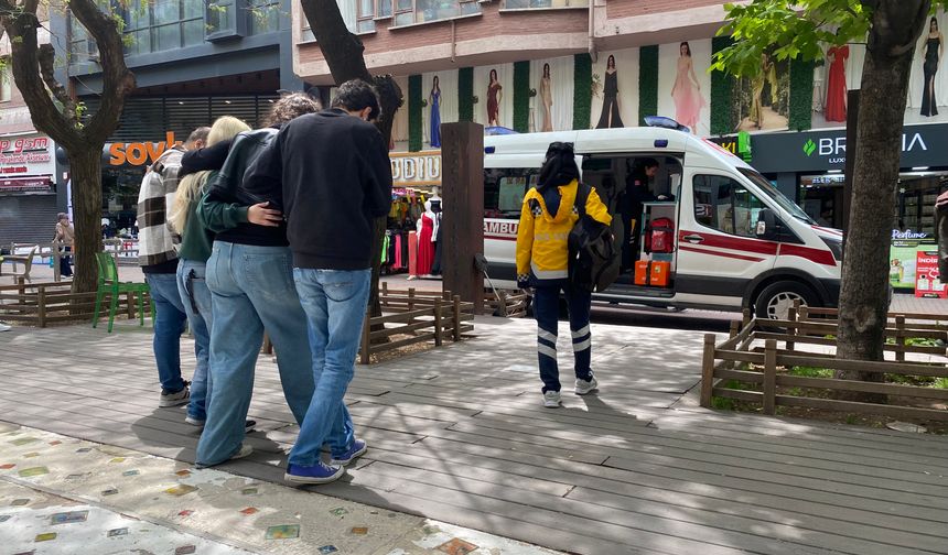 Mağazada yere düşen kadın yaralandı